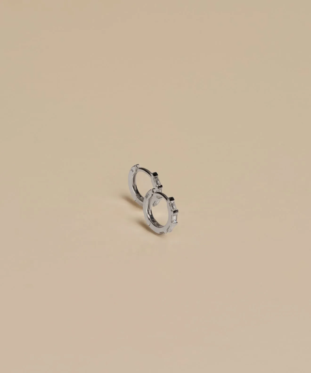 Merit Baguette Hoops sold by Jenni Kayne