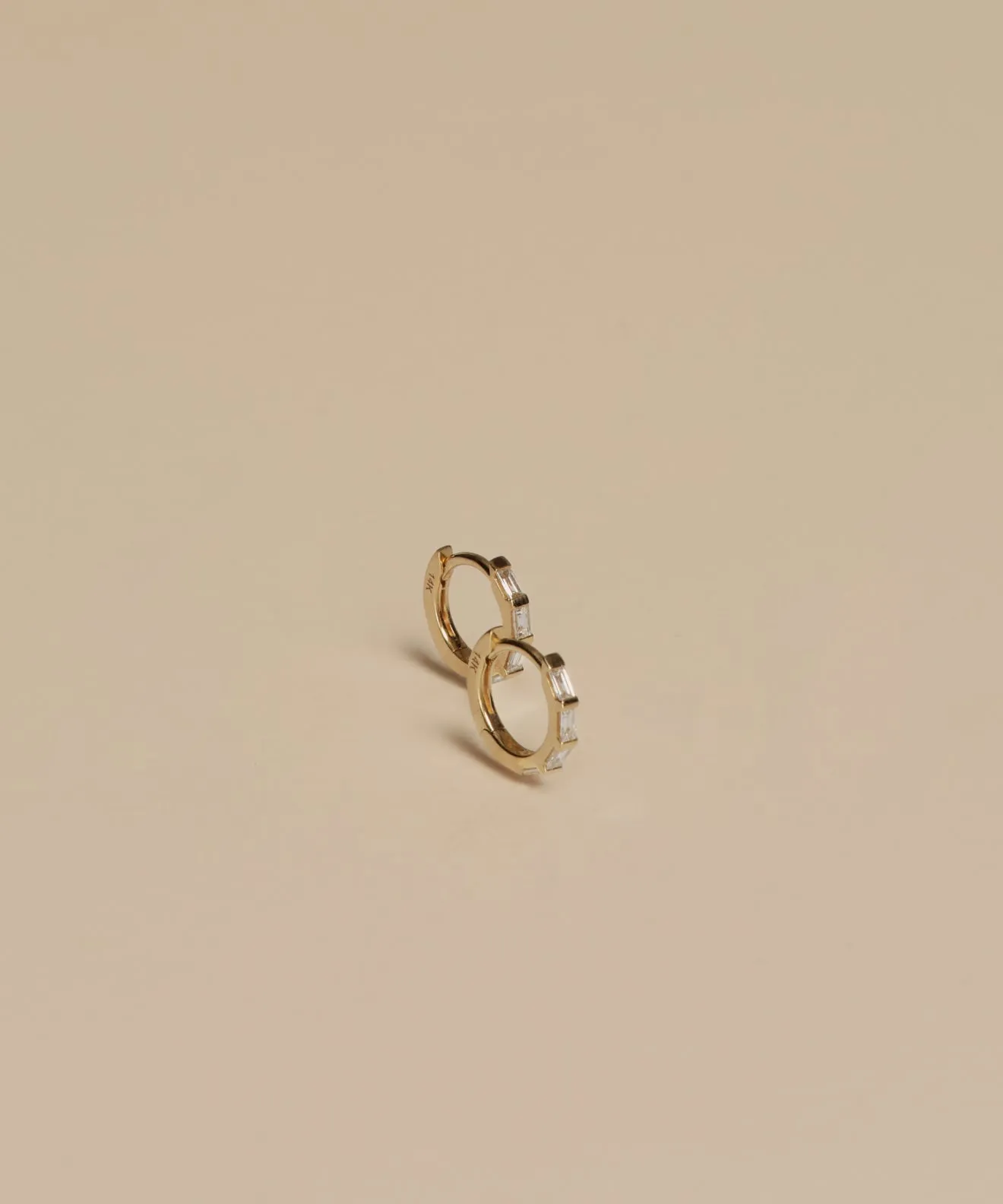 Merit Baguette Hoops sold by Jenni Kayne