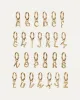 Single Monogram Huggie Earring - E sold by JENNY BIRD