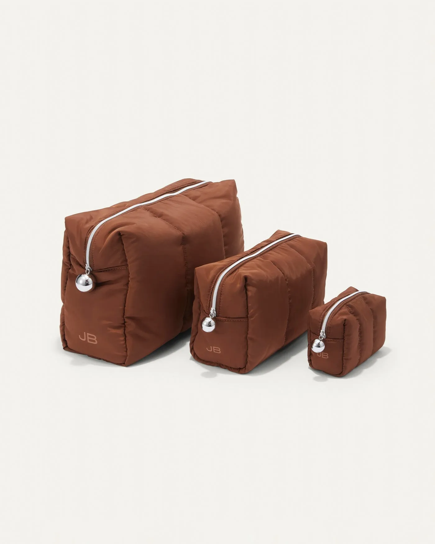 Puffy Pouch - Set of Three sold by JENNY BIRD