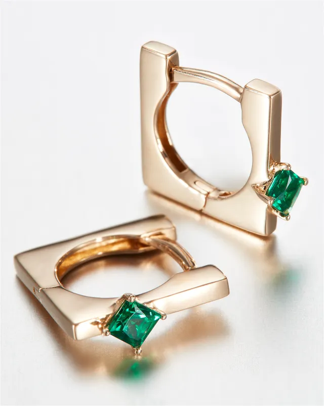14K Gold Lab Grown Emerald Huggie Earrings sold by JENNY BIRD
