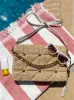Lexi Crossbody in Straw Natural sold by Jessica Simpson