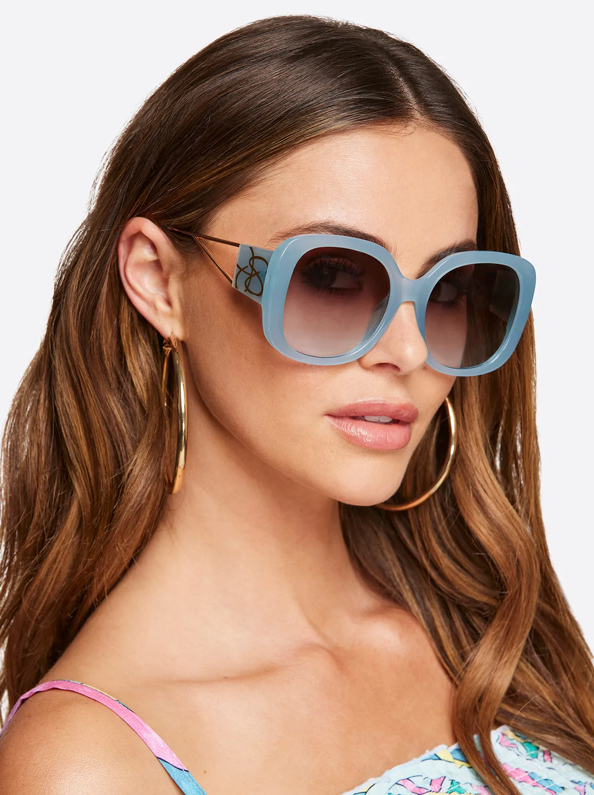 Oversized Oval Sunglasses in Blue sold by Jessica Simpson