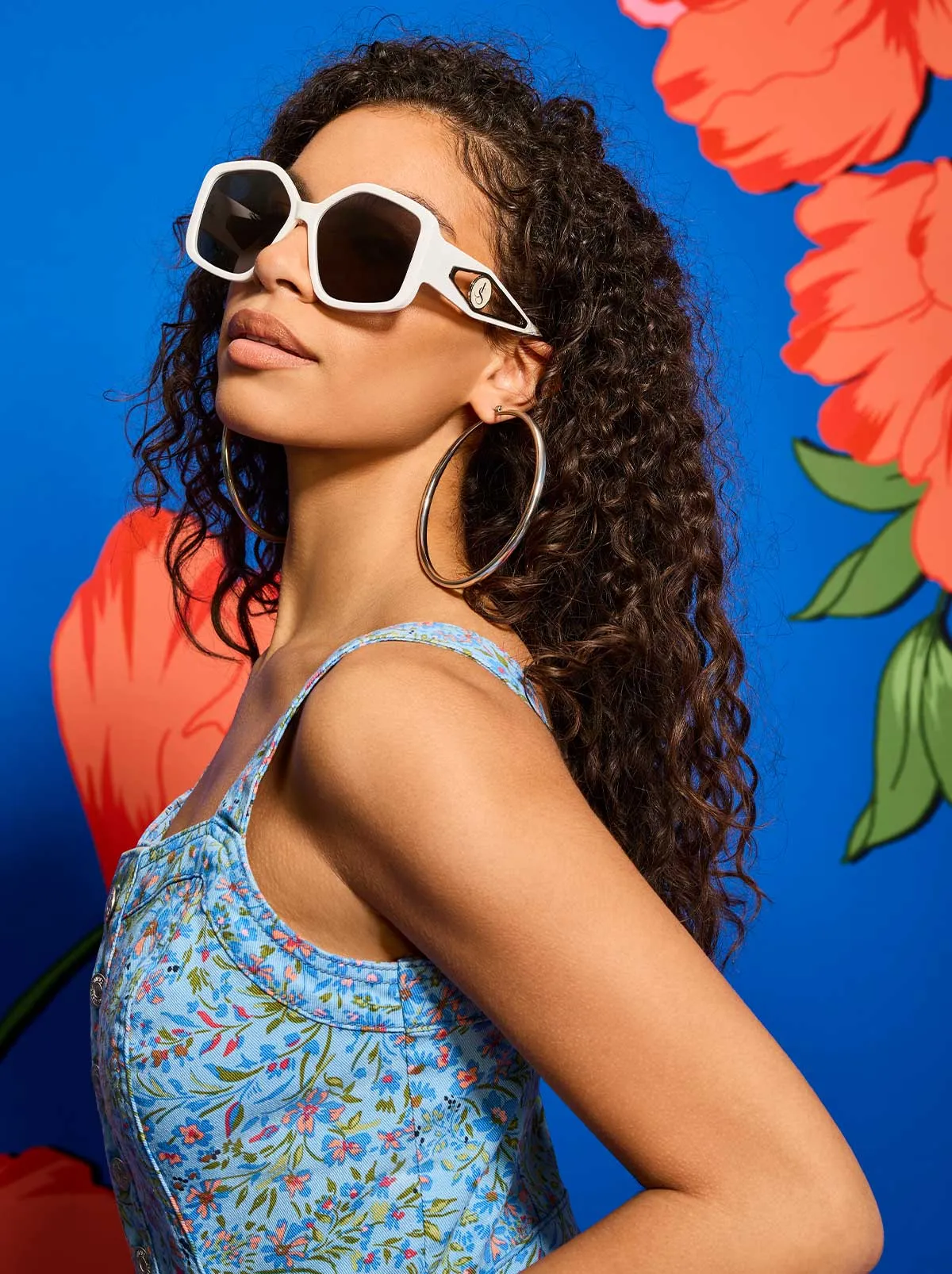 Oversized Geometric Sunglasses in White sold by Jessica Simpson