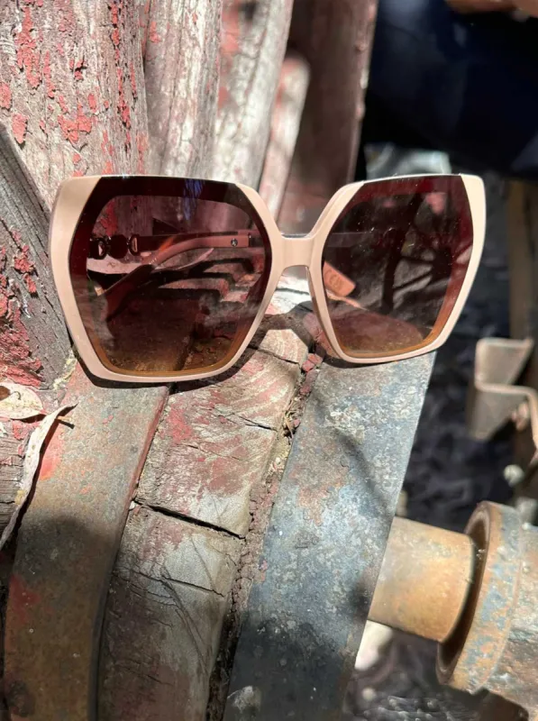 Geometric Metal Temple Sunglasses in Nude sold by Jessica Simpson