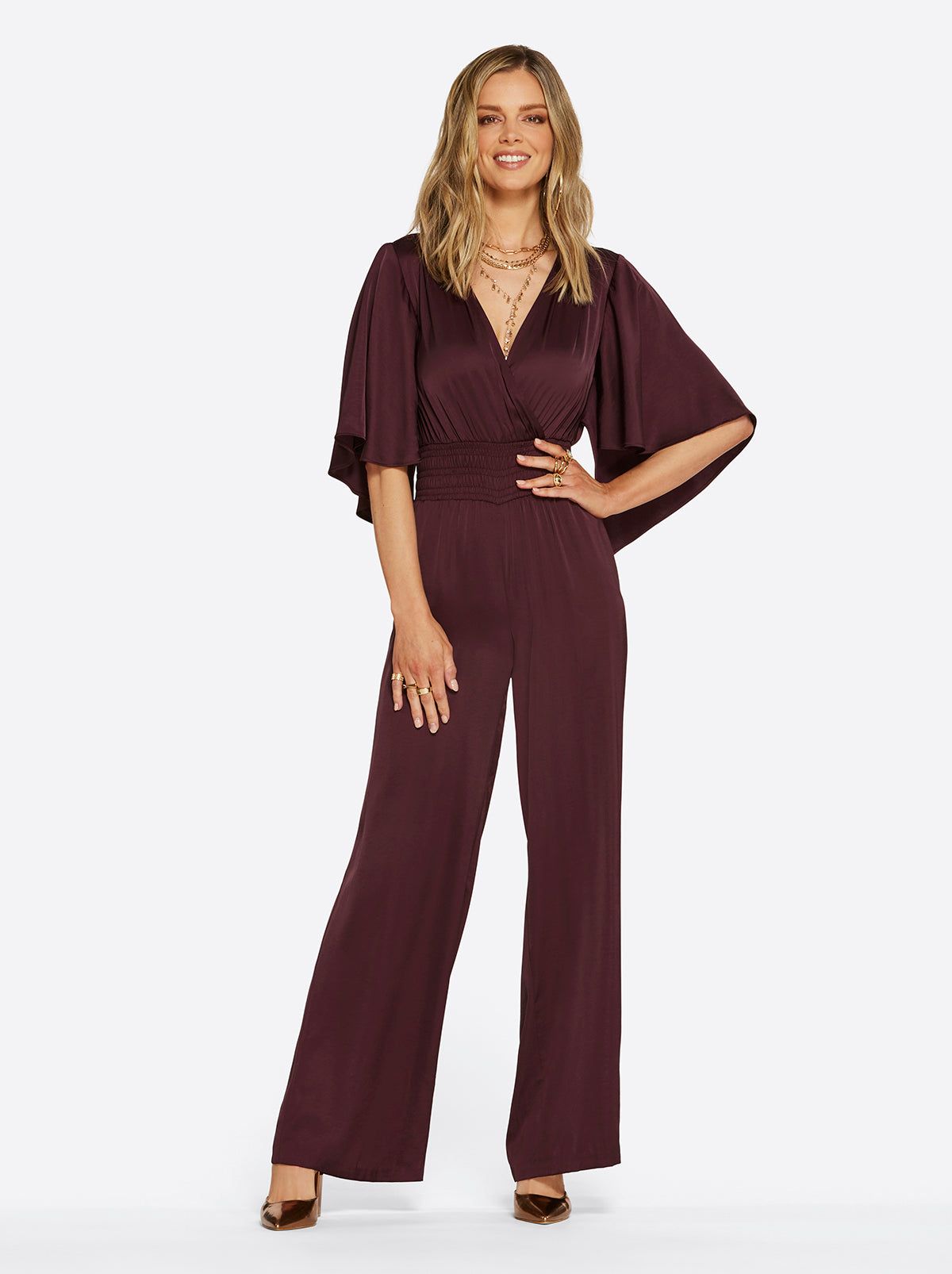 Aria Jumpsuit in Winetasting sold by Jessica Simpson
