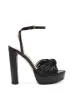 Immie Platform Sandal in Black Snake sold by Jessica Simpson