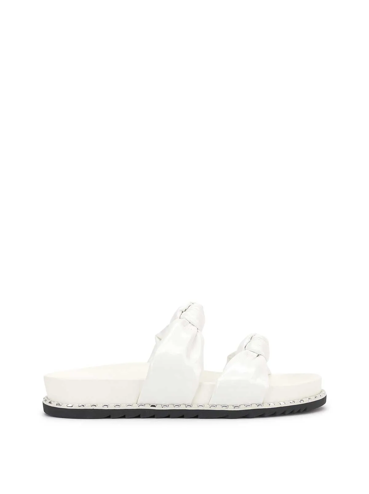 Caralyna Flat Sandal in White sold by Jessica Simpson
