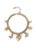 Heart & Butterfly Charm Bracelet sold by Jessica Simpson