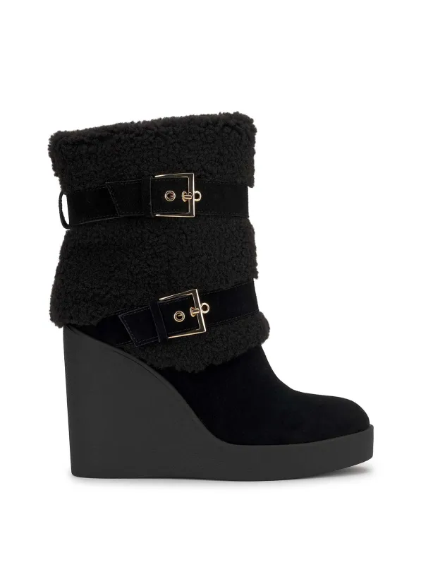 Metzyn Wedge Bootie in Black sold by Jessica Simpson