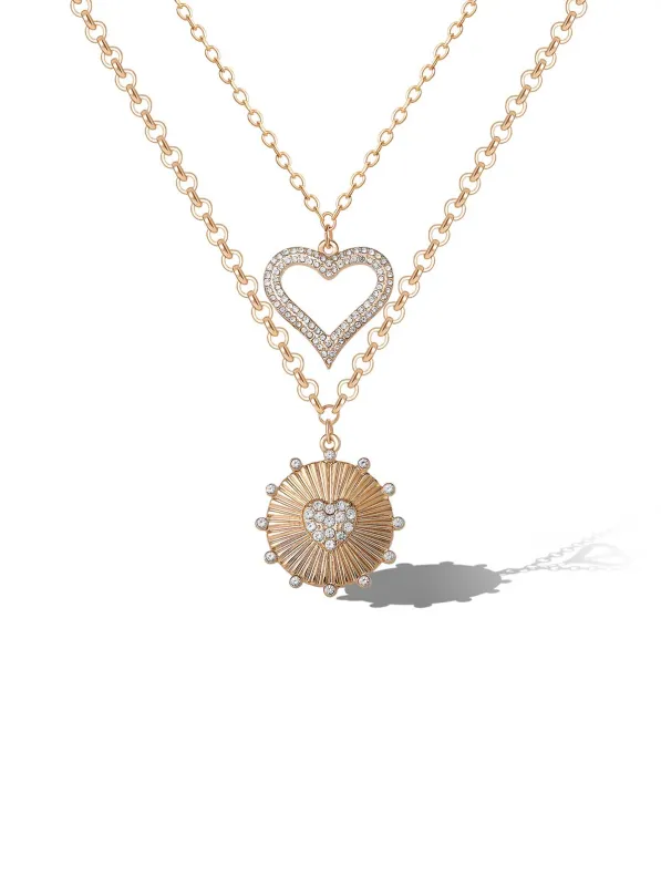 Layered Heart & Sunburst Pendant Necklace Set sold by Jessica Simpson