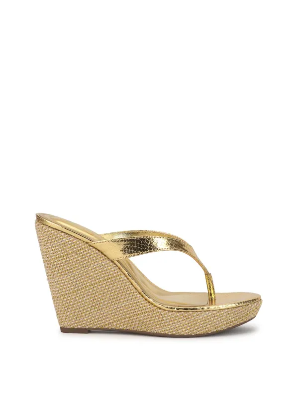 Jyseta Wedge in Gold sold by Jessica Simpson