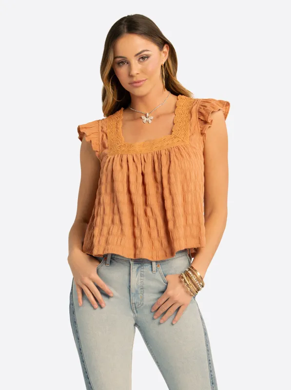 JS Jessica Simpson Dani Lace Trimmed Blouse in Camel sold by Jessica Simpson