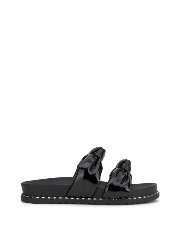 Caralyna Flat Sandal in Black sold by Jessica Simpson