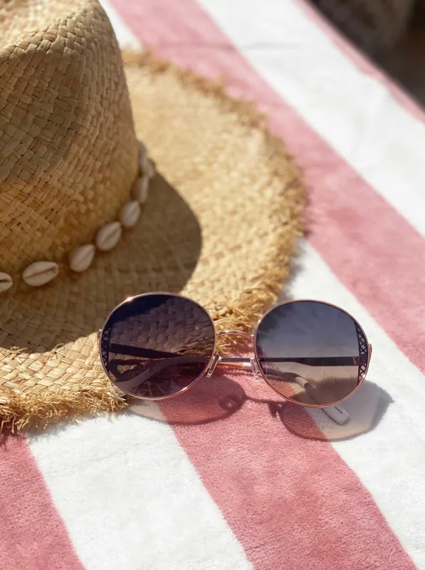 Metal Round Sunglasses in Rose Gold sold by Jessica Simpson