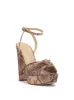 Immie Platform Sandal in Snake sold by Jessica Simpson