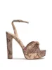 Immie Platform Sandal in Snake sold by Jessica Simpson