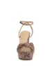 Immie Platform Sandal in Snake sold by Jessica Simpson