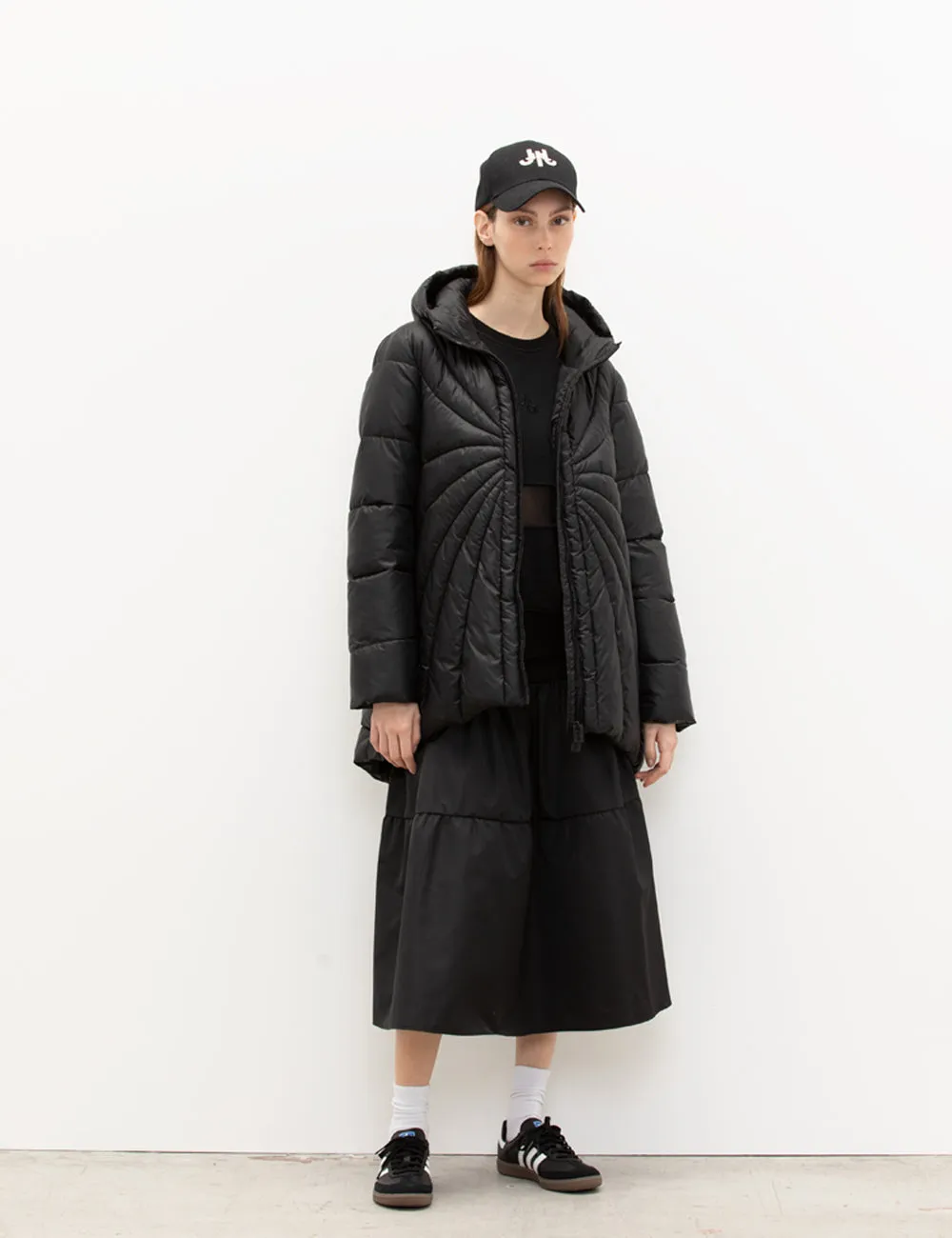 Piumino lungo con cappuccio sold by Jijil