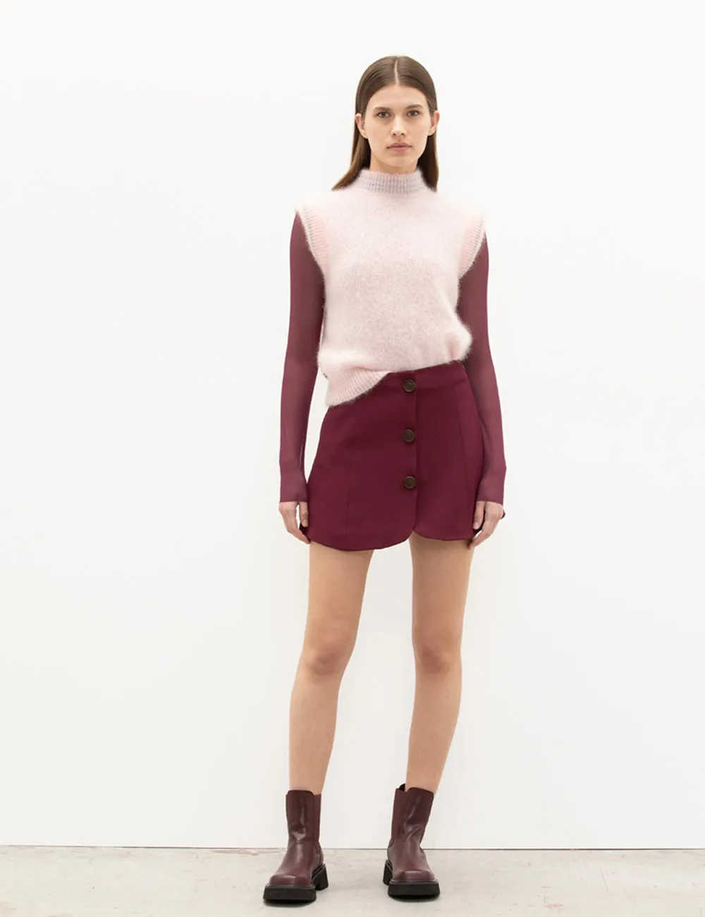 Maglia smanicata con collo alto sold by Jijil