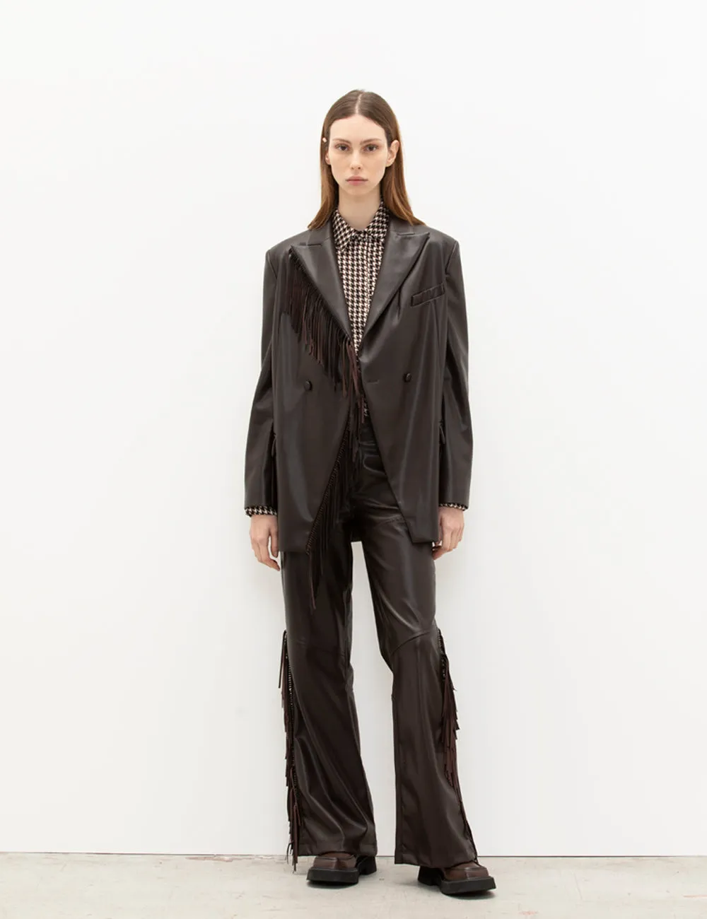 Giacca over in pelle con frange sold by Jijil