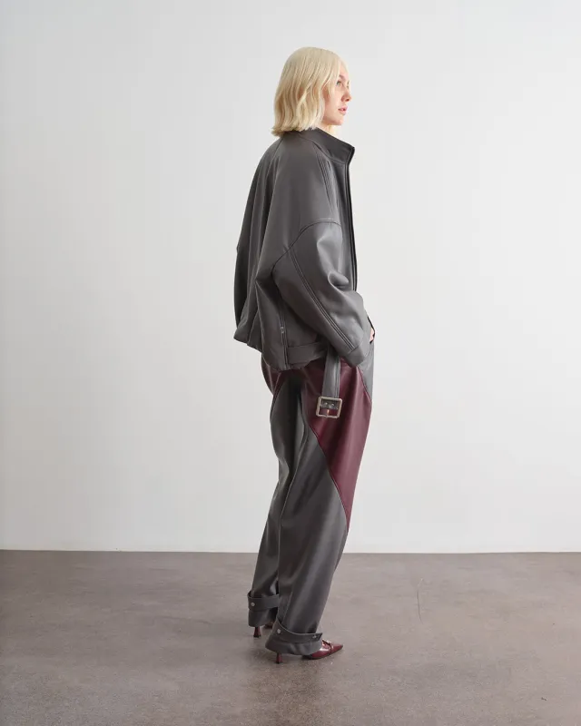 Pantalone bicolor con inserti a contrasto sold by Jijil