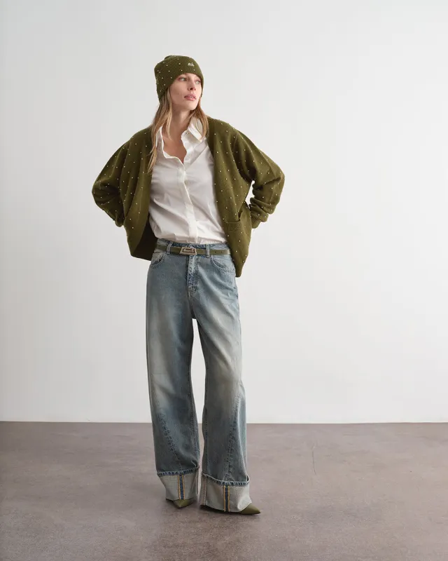 Pantalone in denim a gamba larga sold by Jijil