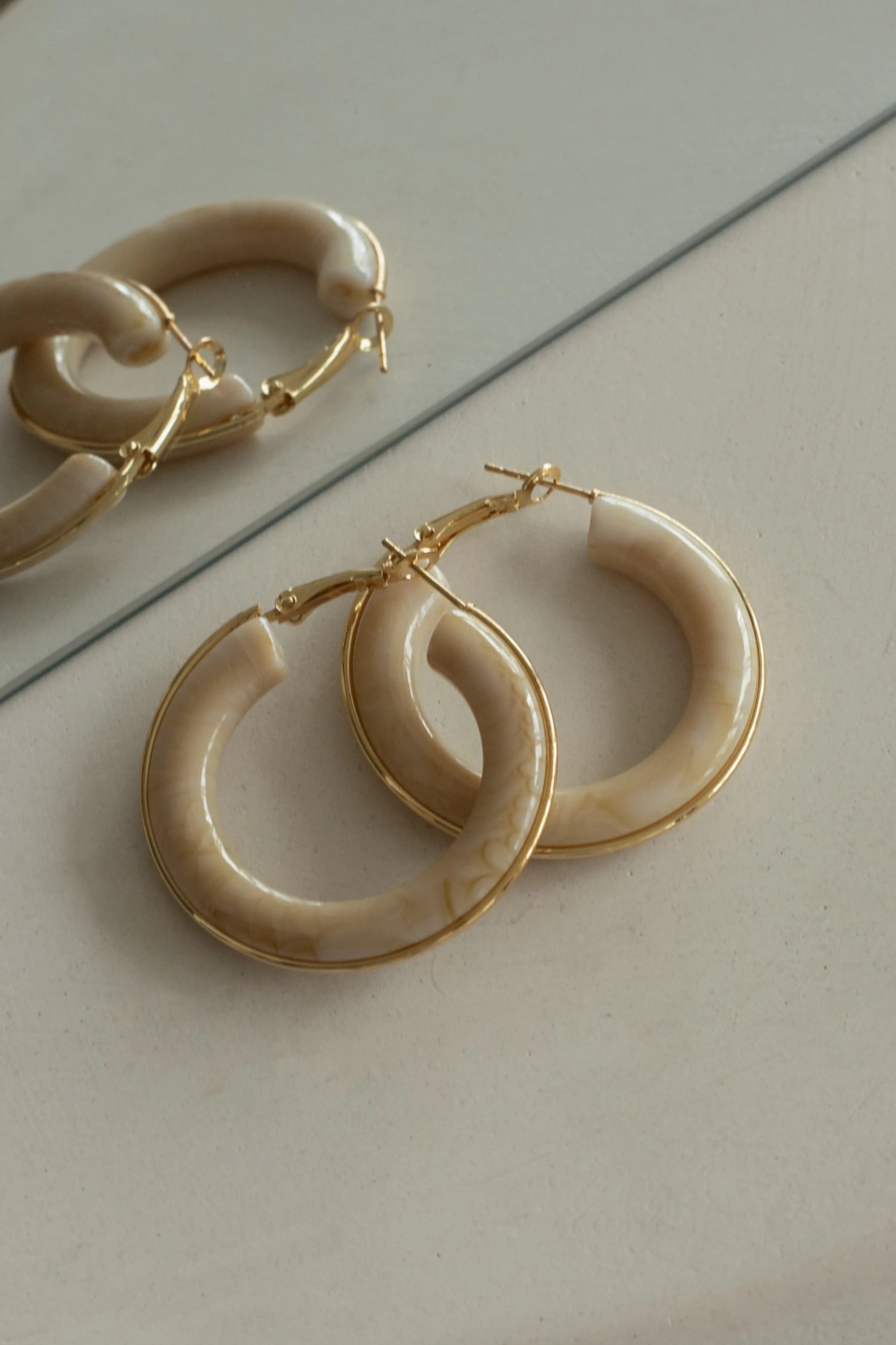 Ivory Shai Earrings sold by JLUXLABEL