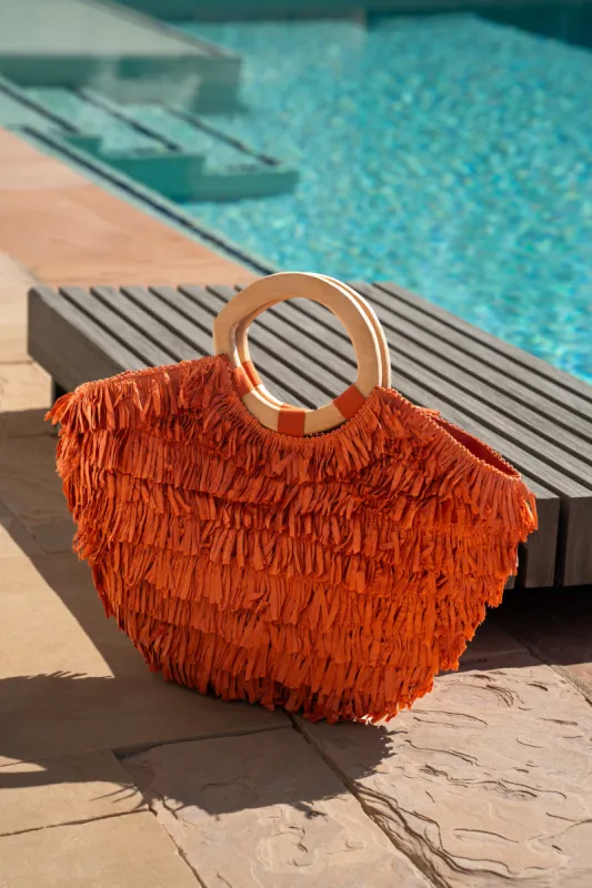 Coral Mediterranean Fringe Handbag sold by JLUXLABEL