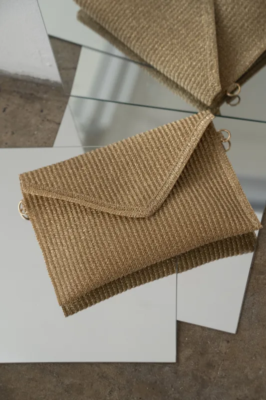Gold Envelope Woven Clutch sold by JLUXLABEL