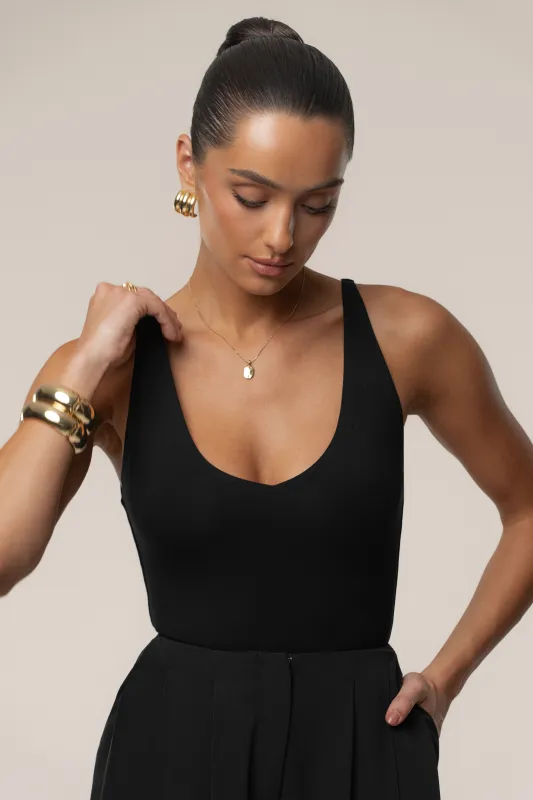 Black Base Layer Bodysuit sold by JLUXLABEL