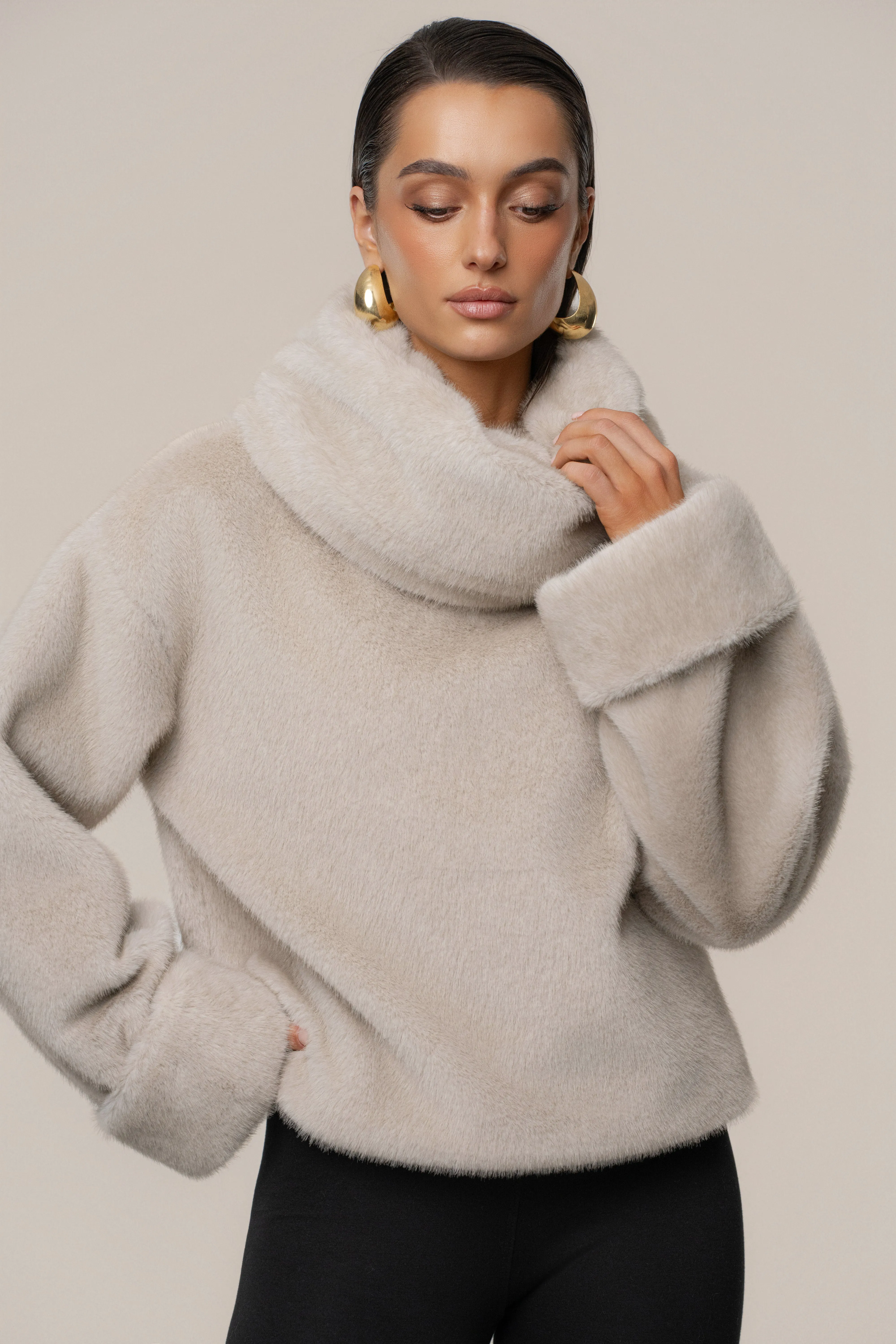 Stone Polished Faux Fur Pullover sold by JLUXLABEL