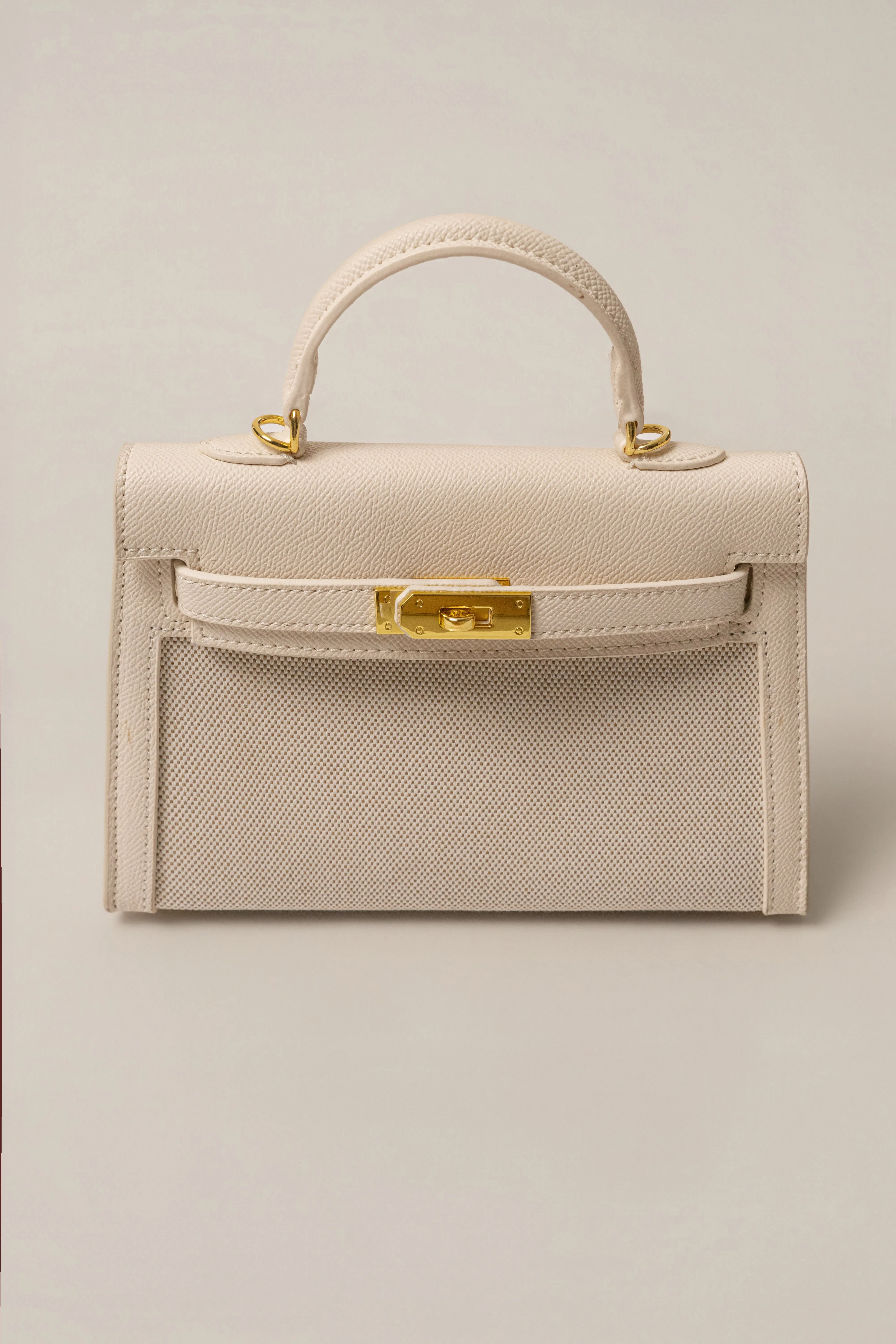 White Defined Canvas Mini Bag sold by JLUXLABEL