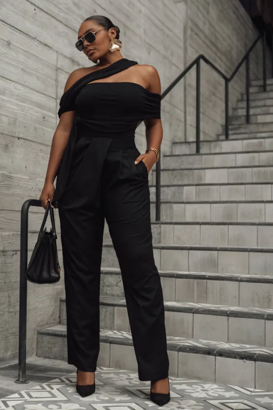 Black Asymmetrical Draped Trousers sold by JLUXLABEL
