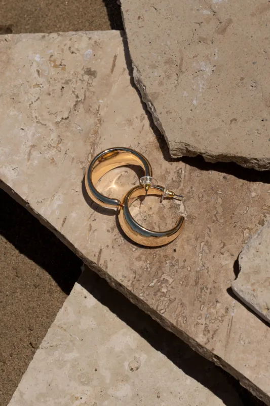 Gold Cynn Open Hoop Earrings sold by JLUXLABEL