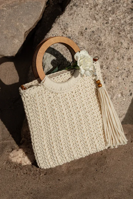 Ivory Hideaway Handbag sold by JLUXLABEL