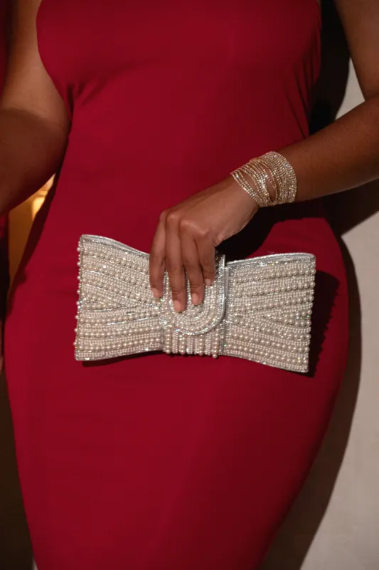 Silver Daisie Rhinestone Clutch sold by JLUXLABEL