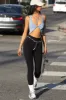 Halter Twist Tank sold by Joah Brown