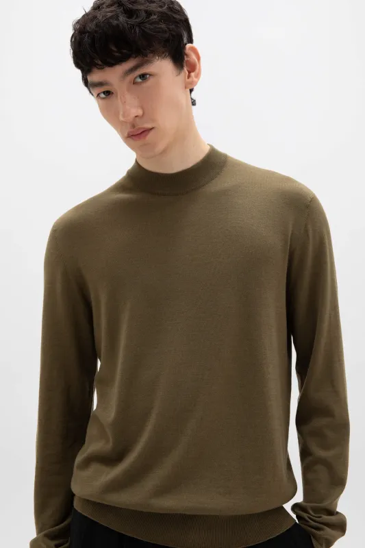 Mock Turtle Neck Merino Olive Green Jumper sold by Johnstons of Elgin