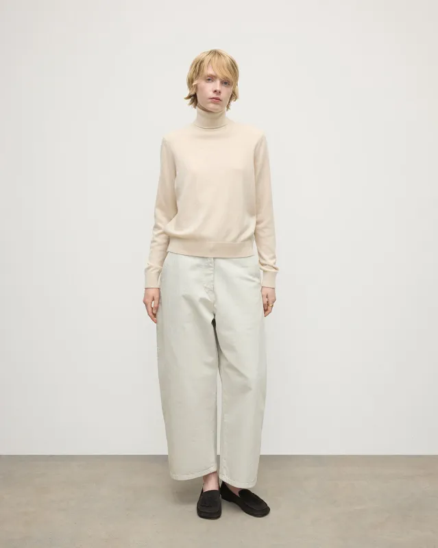 Classic Cashmere Cream Roll Neck Jumper sold by Johnstons of Elgin