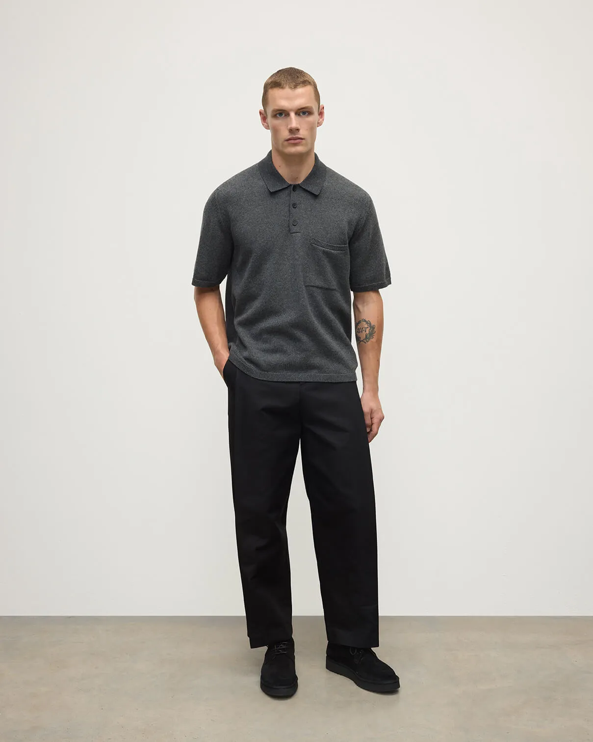 Superfine Merino Relaxed Charcoal Polo Shirt sold by Johnstons of Elgin