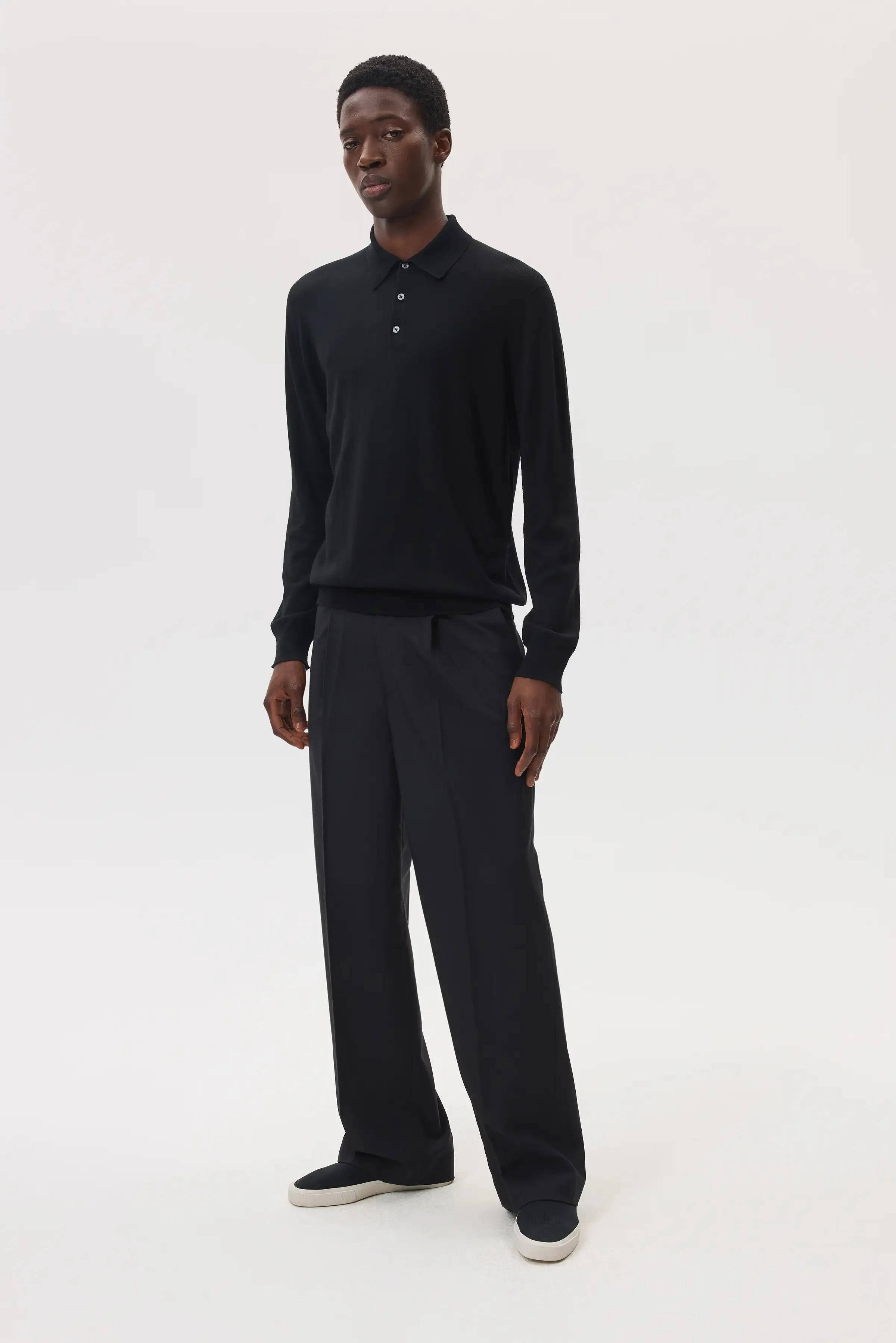 Merino Long Sleeve Black Polo Shirt sold by Johnstons of Elgin