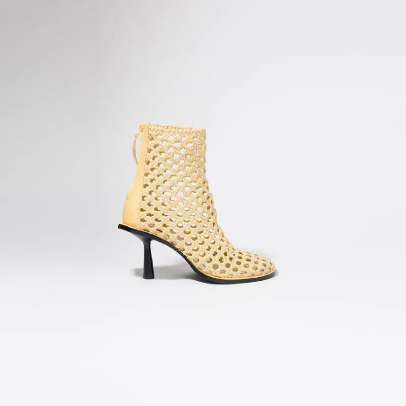 Alex Heeled Boot sold by Jonathan Simkhai