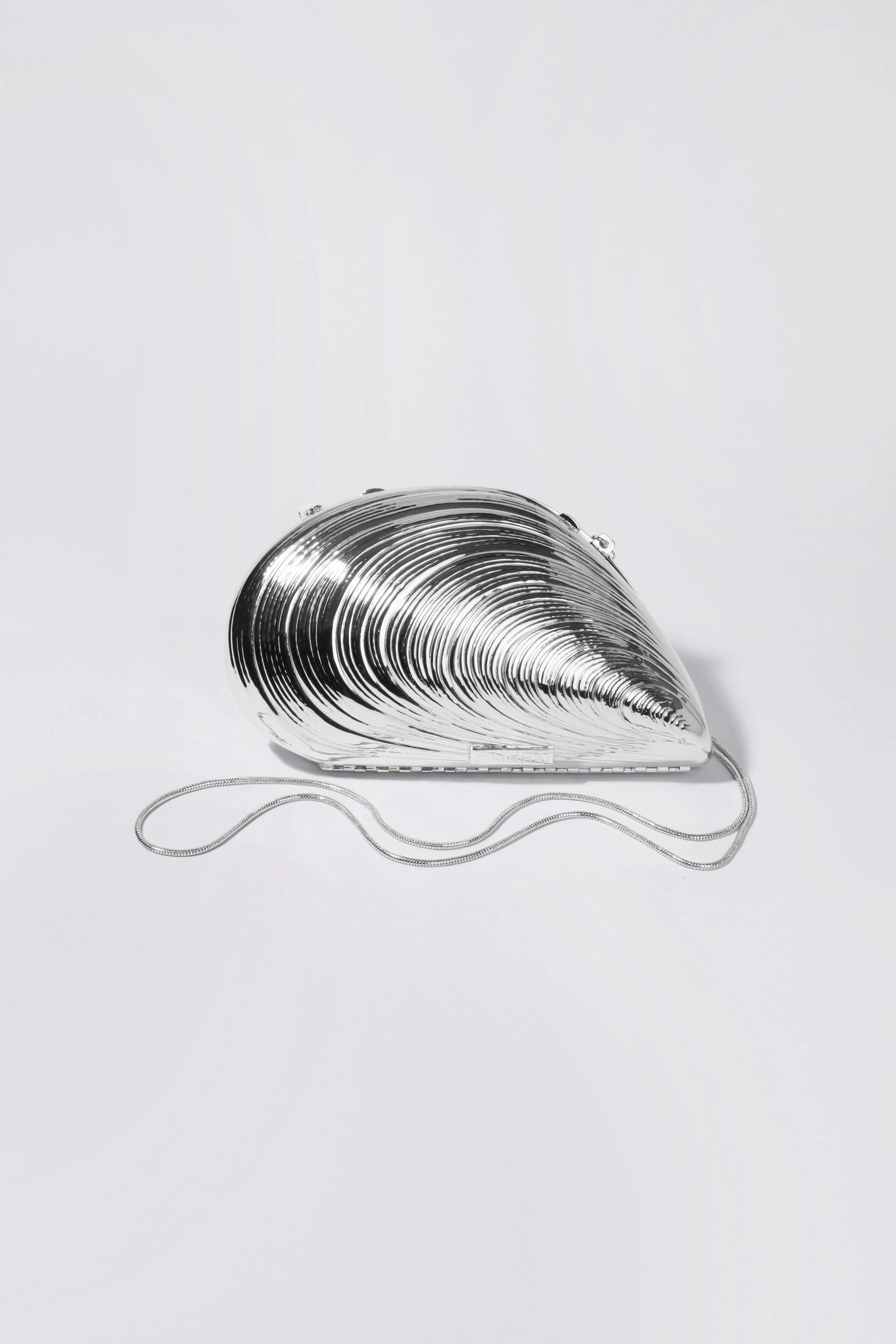 Bridget Metal Oyster Clutch sold by Jonathan Simkhai