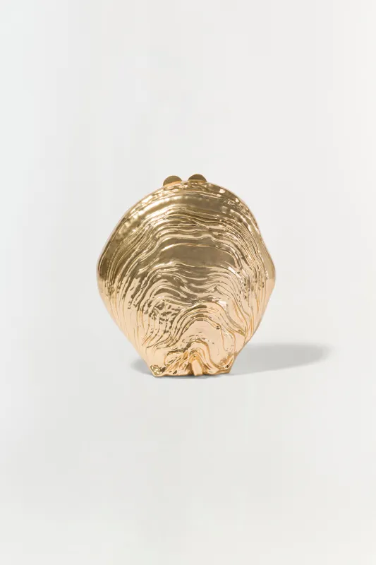 Cove Shell Clutch sold by Jonathan Simkhai