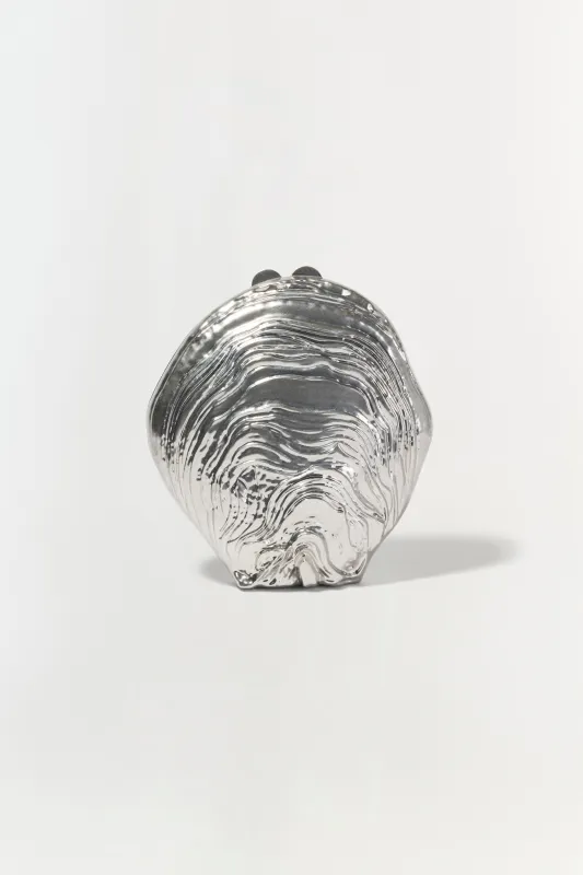 Cove Shell Clutch sold by Jonathan Simkhai