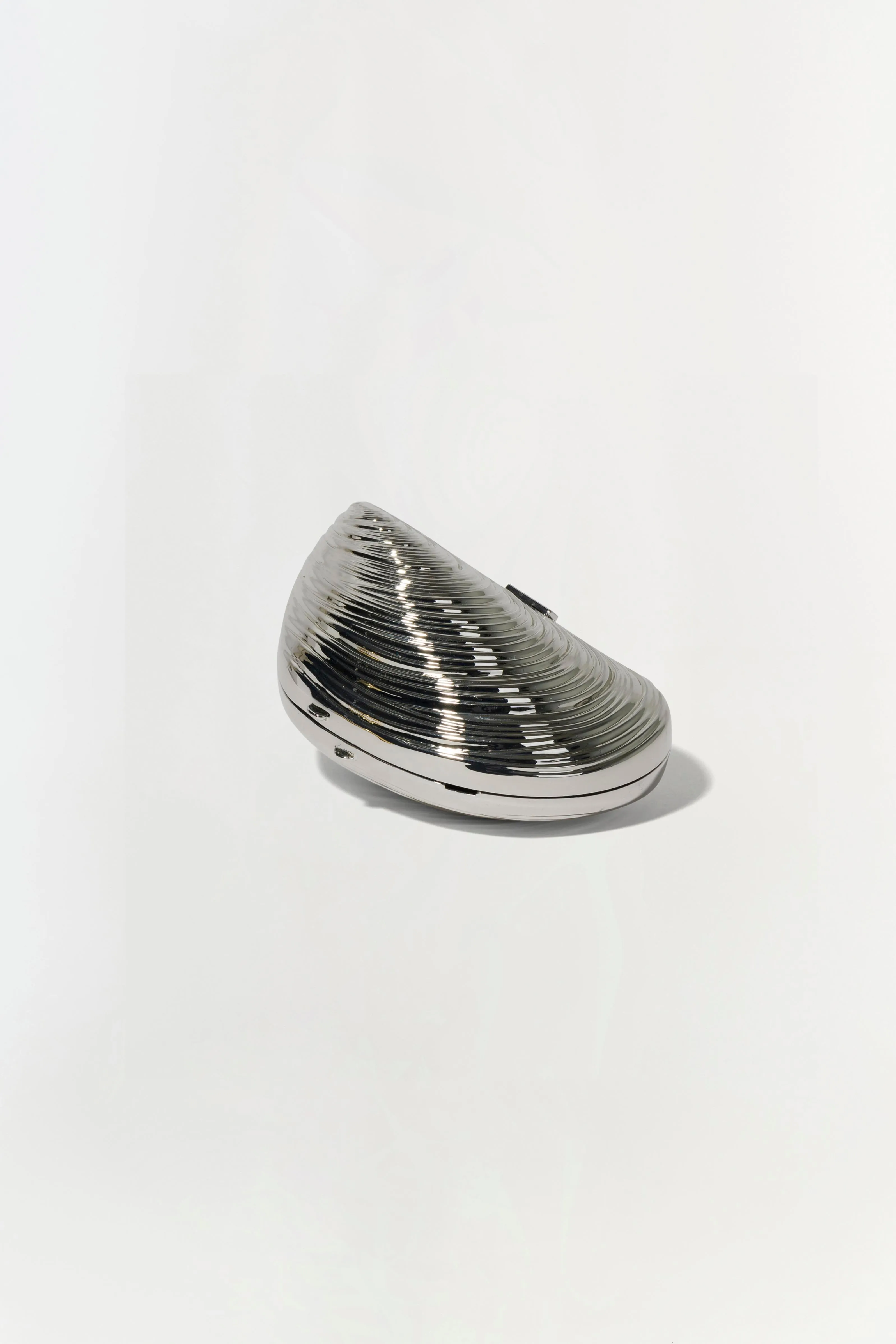 Bridget Mini Metal Oyster Clutch sold by Jonathan Simkhai