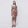 Kensingten Printed Mesh Skirt sold by Jonathan Simkhai