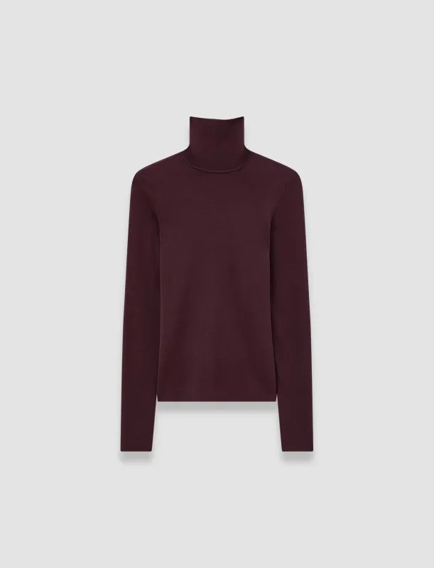 Silk Stretch High Neck Top sold by Joseph