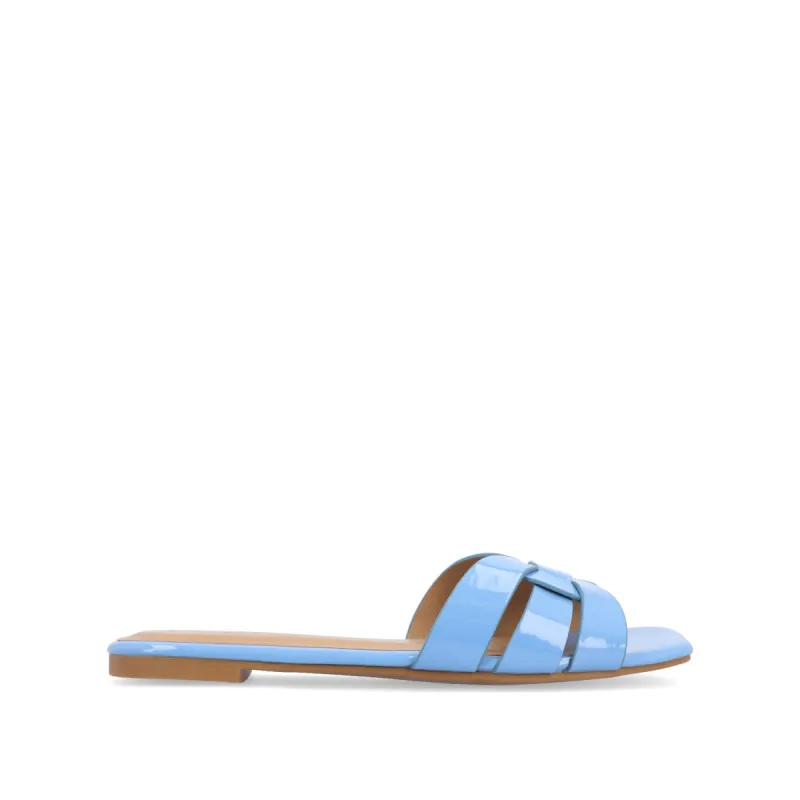 ARRINA SLIDE SANDALS IN STATEMENT PATENT sold by Journee Collection
